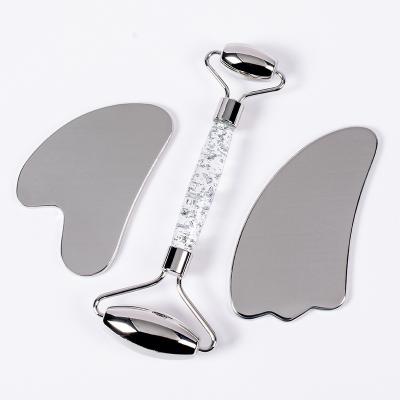 China Lift Skin 2021 Hot Selling Stainless Steel Facial Massage Tool Roller Gua Sha Set for sale