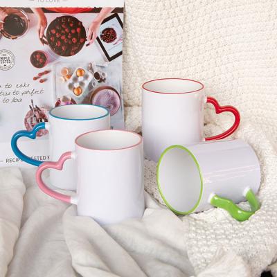 China Sustainable Wholesale Sublimation Heart Shape Handle Ceramic Mug Custom Bulk Coffee Mugs for sale