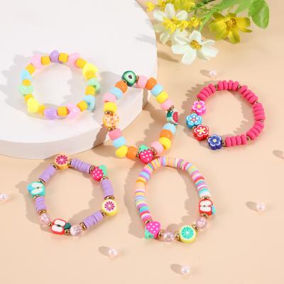 China Cute Acrylic Flower and Fruit Clay Bracelet Pink Princess Series Pieces Soft Kids Ceramic Bracelets for sale