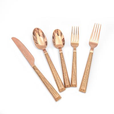 China Viable Hot Selling Stainless Steel Plastic Cutlery Sets Stainless Steel Handle Spoon Knife Fork Safe Material Classic Wooden Design Gold for sale