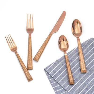 China Statistical Stas Spoon Fork Knife Royal Wooden Design Durable Popular Safe Material Gold Plastic Handle SS Cutlery Sets for sale