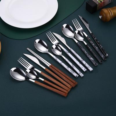 China Amazon Viable Hot Sales Natural Jieyang Texture Flatware Marble Look Stainless Steel Cutlery Set With Plastic Handle for sale