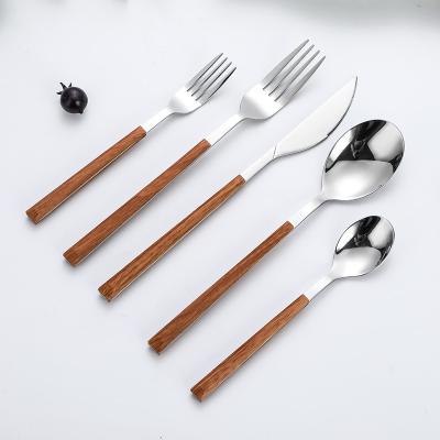 China Best Selling Viable White Ceramic Handle Cutlery Set Restaurant Hotel Cafe Fruit Knife Fork Spoon Stainless Steel Flatware for sale