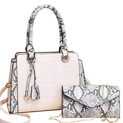 China 2021 daily used autumn and winter new atmospheric PU handbag large capacity snake print one-shoulder messenger bag for sale