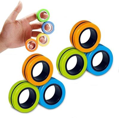 China Magic Finger Ring Props Tools Decompression Toys Moving Person Gift Cheap Magnetic Finger Training Kids Toys Prices For Children for sale