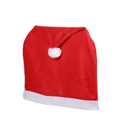 China Christmas Red Nonwoven Chair Cover Chair Hat Christamas Decoration Santa Claus Cotton Table Back Cover For Home Decorations for sale