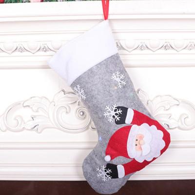 China Christamas Gift Bag Led Snowman Santa Elk Bear Printing Xmas Candy Gift Bag Christmas Stockings Knocks Chimney Christmas Stocking for sale