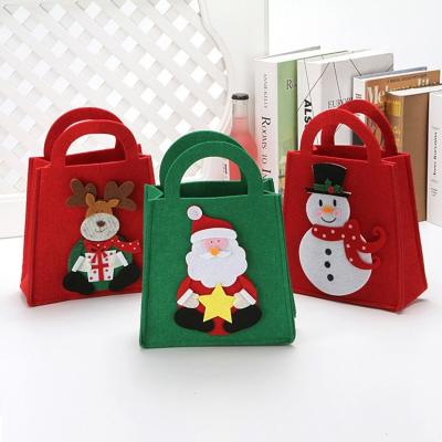 China High Quality Eco - Friendly Felt Fabric Santa Claus Christmas Gift Bags For New Year Gift for sale