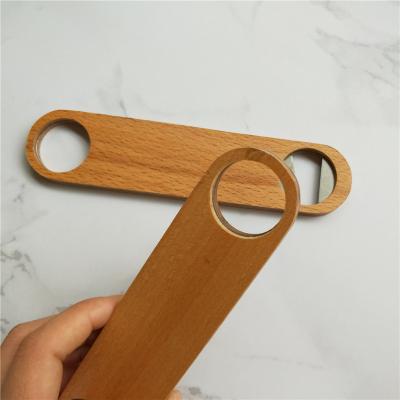 China Sustainable Customized Logo Bottle Opener Engraved Empty Wooden Beer Opener for sale