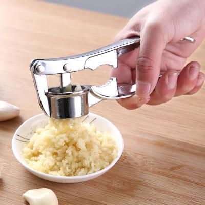 China Stocked Stainless Steel Alloy Garlic Press Crusher Kitchen Tool for sale