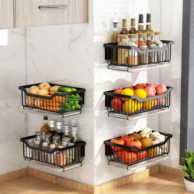 China Multi-functional Nail Viable Free Hanging Storage Basket Commodity Shelf Kitchen Vegetable Storage Baskets for sale