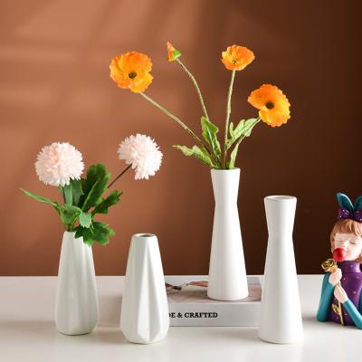 China Minimalist White Vases For Home Decoration 2021 Luxury Vase Home Vase Mold Decor for sale