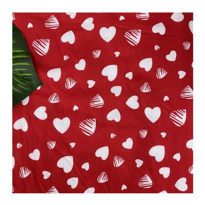 China Pure hot sale woven reactive heart shaped printed cotton fabric for ladies dress for sale