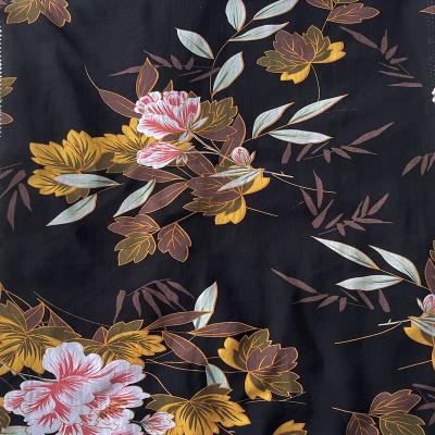 China Cheapest and good fashionable pure design 100%Polyester rayon printed fabric stock lot for making women's dress t-shirt for sale