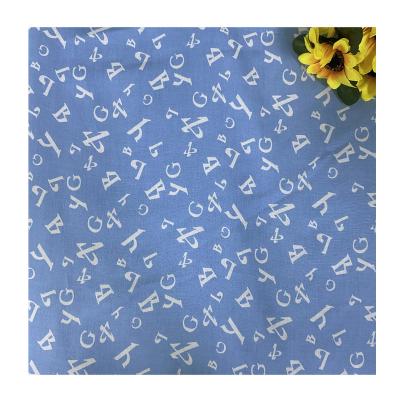 China Pure Fashion 100GSM Digital Alphabetic 100%Rayon Printed Fabric For Making Individual Shirt Dress for sale