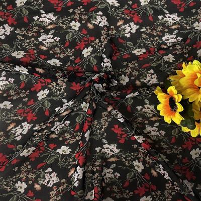 China Good quality 80gsm pure black 2021 pattern 100%Polyester floral print chiffon fabric for making women's dress shirt garment for sale