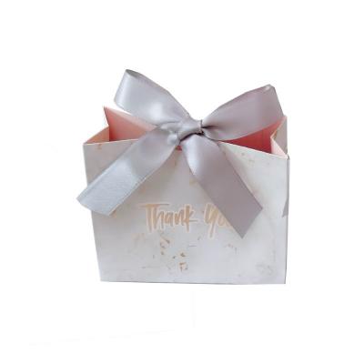 China Recyclable custom hot paper folding custom paper box festival gift box fashion candy bag for sale