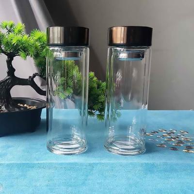 China Sustainable Reusable Eco-friendly High Borosilicate Double Wall Insulated Clear Glass Water Bottle with Fruit Tea Infuser for Boiling Water for sale