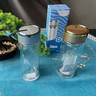 China Sustainable Good Quality Eco-friendly Clear Double Wall High Borosilicate Reusable Glass Water Bottle with Stainless Steel Tea Filter for sale