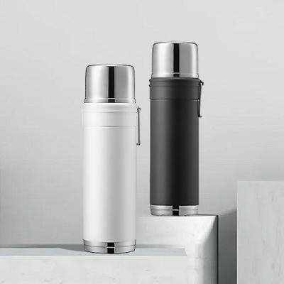 China PORTABLE Luxury Portable Stainless Steel Double Wall Vacuum Insulated Corporate Thermos with Metal Handle for sale