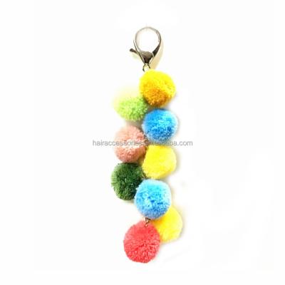 China Various Retro Fur Ball Pompom Tassels Key Chain Pendant Bag Phone Key Chain Charm for sale