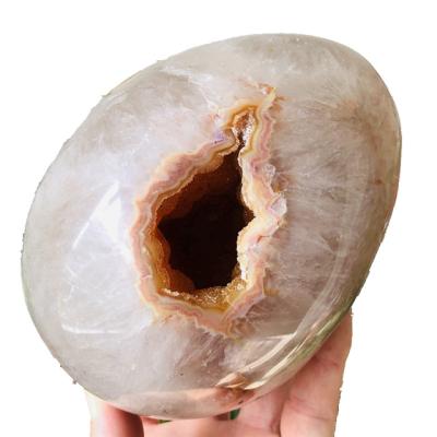 China Wholesale Europe Big Egg Shape Natural Crystal Hole Healing Stone Crystal Geode For Decoration for sale