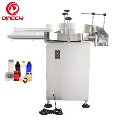 China Round Food Bottle Scramble Machine Turntable Feeding Unscrambler Table For Cans PET Bottles Glass Jars for sale