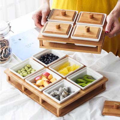 China Viable Wholesale Condiment Set Creative Dry Fruit Tray With Divider Cover Candy Nut Storage Box Ceramic Fruit Tray for sale