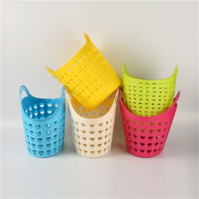 China Sustainable Hot Sale Colorful Wash Plastic Dirty Basket Clothes Laundry Storage Dirty Hamper With Handle for sale