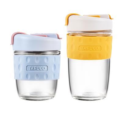 China Sustainable 390ml Silica Gel Top Grade Reusable Glass Portable Coffee Mugs Wholesale for sale