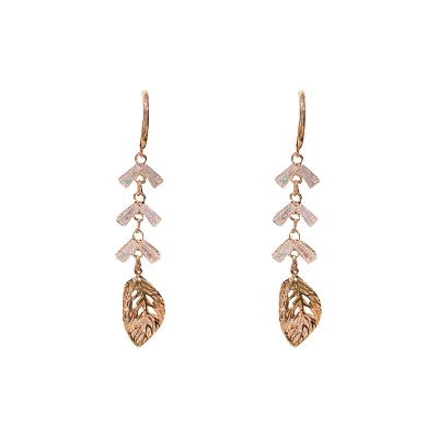 China New 925 Silver Needle Gold Plated Zircon Friendly Cool Small Tassel Earrings Korean Hollow Leaf Earrings for sale