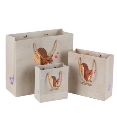 China Eco Recyclable White Apparel Folding Cardboard Christmas Gift Rose Gold Craft Floral White Paper Bag Thank You for sale