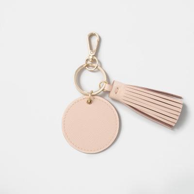 China Office Car Key Wallets Luxury Chained Saffiano Leather Round Key Holder With Tassels for sale