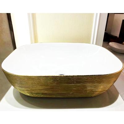 China EUROPEAN Style European Countertop Basin Swept Small Rectangular Bathroom Sinks Gold Hand Wash Basins for sale