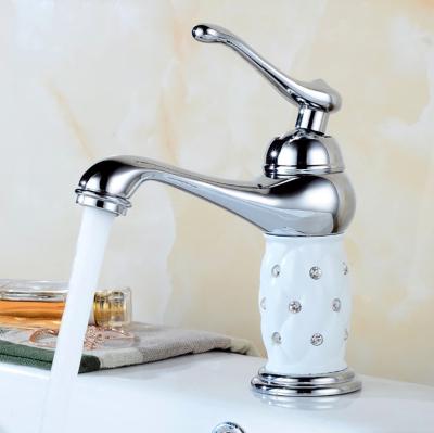 China Artistic Modeling Rotating Copper Water Faucets Metered Antiquity Splash Proof Countertop Ware Basin Faucets Sanitary Diamond Faucet for sale