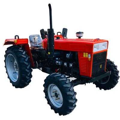 Chine Building Material Shops 2021 Factory Supply Cheap 4x4 Drive Mini Farm Wheeled Tractor For Agriculture à vendre