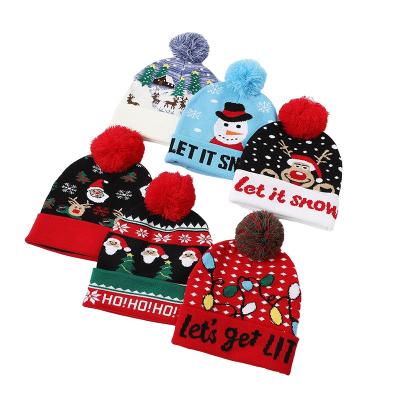 China COMMON 100% Acrylic Custom Jacquard Logo Beanie Hat With POMPOM for sale