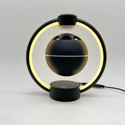 China Minimalist Portable Levitation Music Mini Levitation Blue Tooth Floating Speakers Rotating Night Light for sale