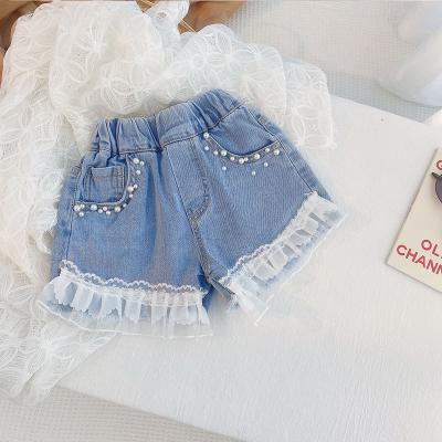 China Sustainable Girl Beach Hot Pants Babies Beads Denim Shorts Lace Up Jeans Kids Shorts Kids Clothing for sale