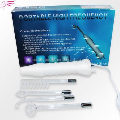 China Anti-Puffiness Home Use Portable High Frequency Facial Machine with 4 Electrode Magic Wands for Skin Care Acne Violet Ray for sale