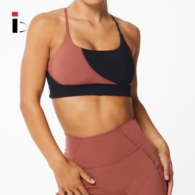 China Latest Design Breathable Summer Color Blocks High Support Quick Dry Workout Tops Women Gym Sports Bra for sale