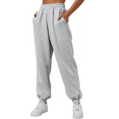 China Hotsale Anti-wrinkle loose joggers pants fashionable lounge pants with pockets, Hotsale autumn strap bottom sweatpants woman for sale