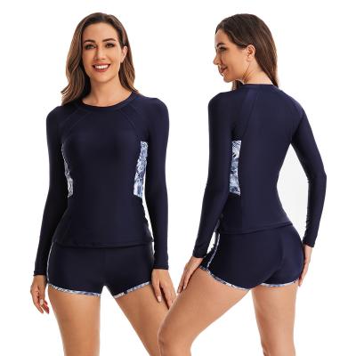 China Two-piece two-piece swimsuit long-sleeved contrasting color round neck ladies training swimwear for sale