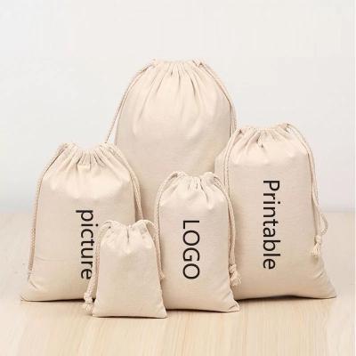 China Custom Logo Cotton Straw Drawstring Canvas Package Bag Canvas Storage Bag for sale