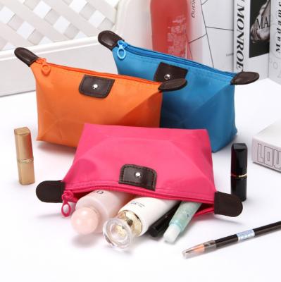 China Fashion dumpling OEM promotion waterproof nylon travel makeup cosmetic stronger bag for sale