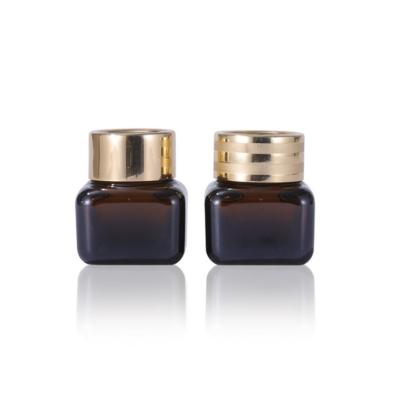 China 15g Brown Color Glass Cream Jar Cosmetic Eye Cream Jar With Gold Cap For Skin Care for sale