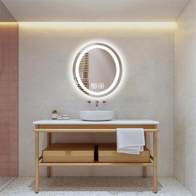 China Modern Copper Free Touch Sensor Oval Fog Sensor Wall Magnifying Smart Bathroom Mirror With Led Lights for sale