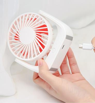 China Creative Desktop USB Mini Handheld Fan Outdoor Hotel Desktop Mute Charging Portable Handheld Fan for sale