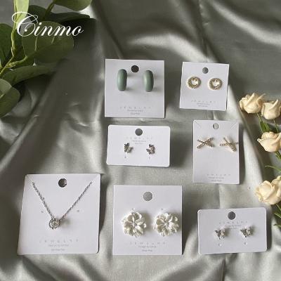 China Custom Cinmo ear stud jewelry elegant/simple carton earrings new small packaging Korean high spot card printing necklace PVC card for sale