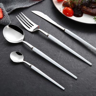 China Sustainable Modern Hollow Handle Dinner Flatware Portugal Design Gold Stainless Steel Cutlery Set for sale